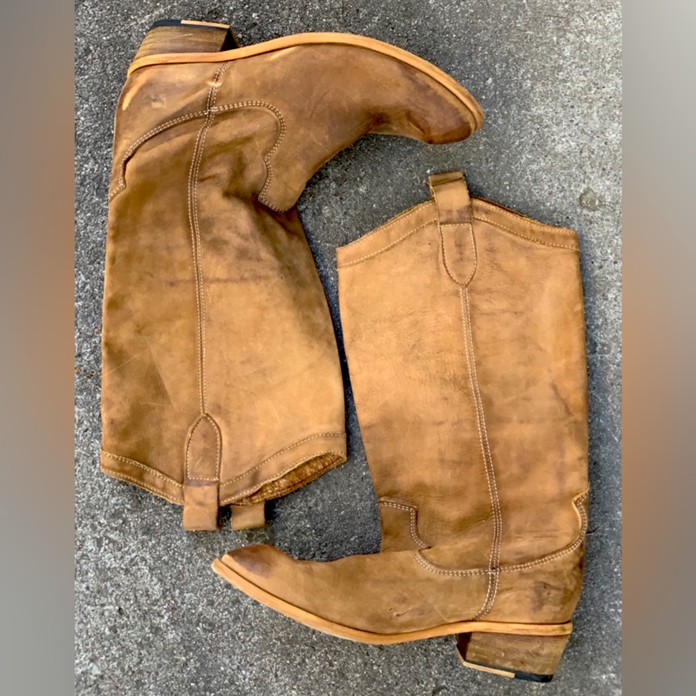 Brown leather cowboy style boots.  Size 9